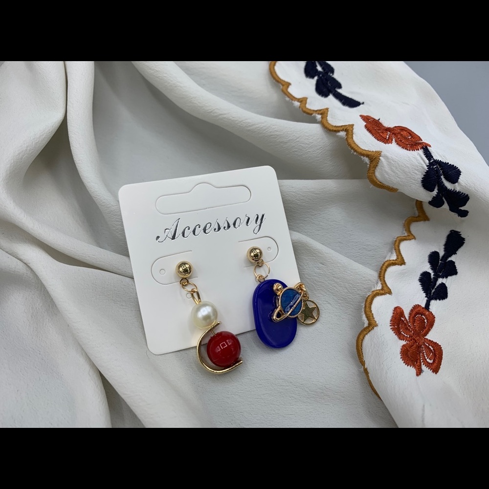 Handmade mismatched earrings—lovely!!